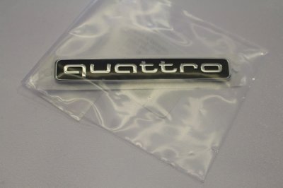 Emblēma / uzraksts QUATTRO AUDI A3 / A4 / A5 / A6 / Q3 / Q5 / TT / R8 OE VAG 4G08537372ZZ